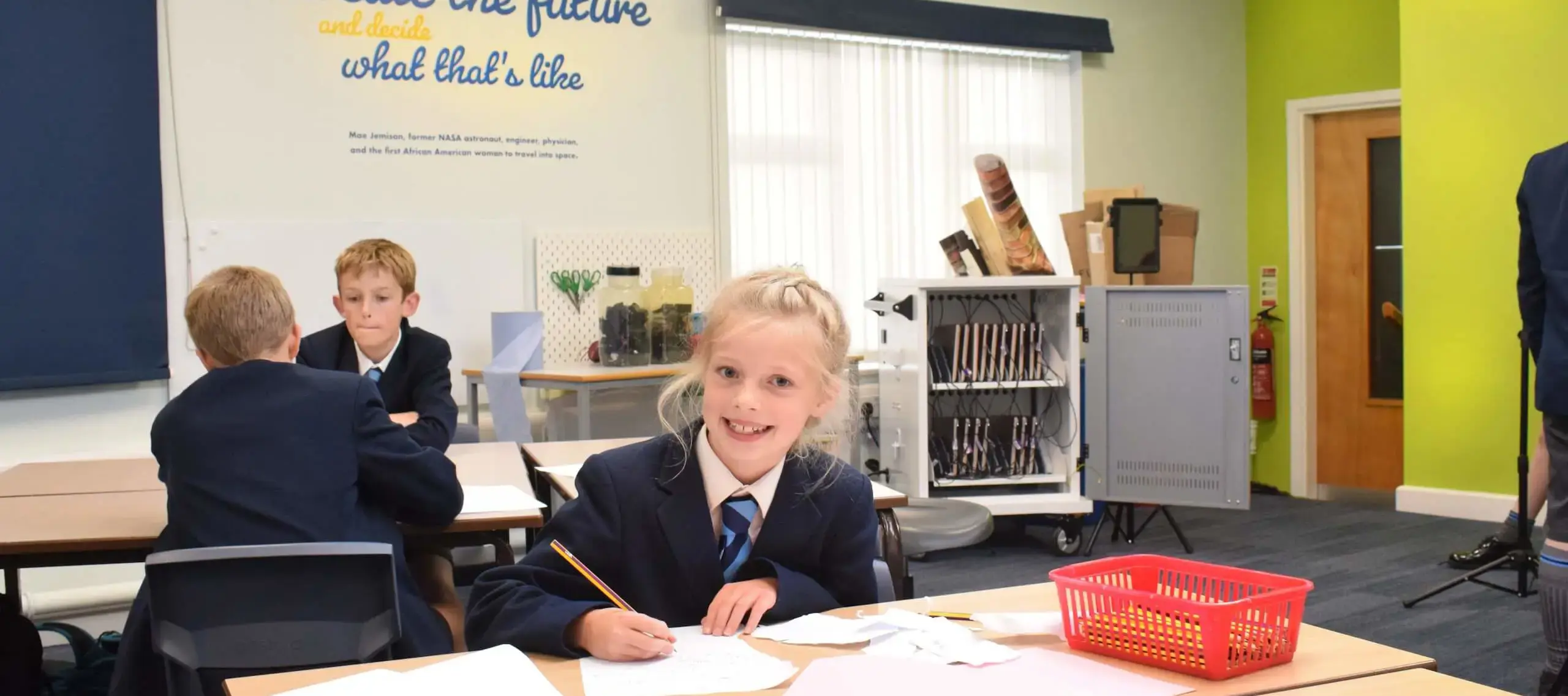 Pocklington Prep School girl at a desk writing