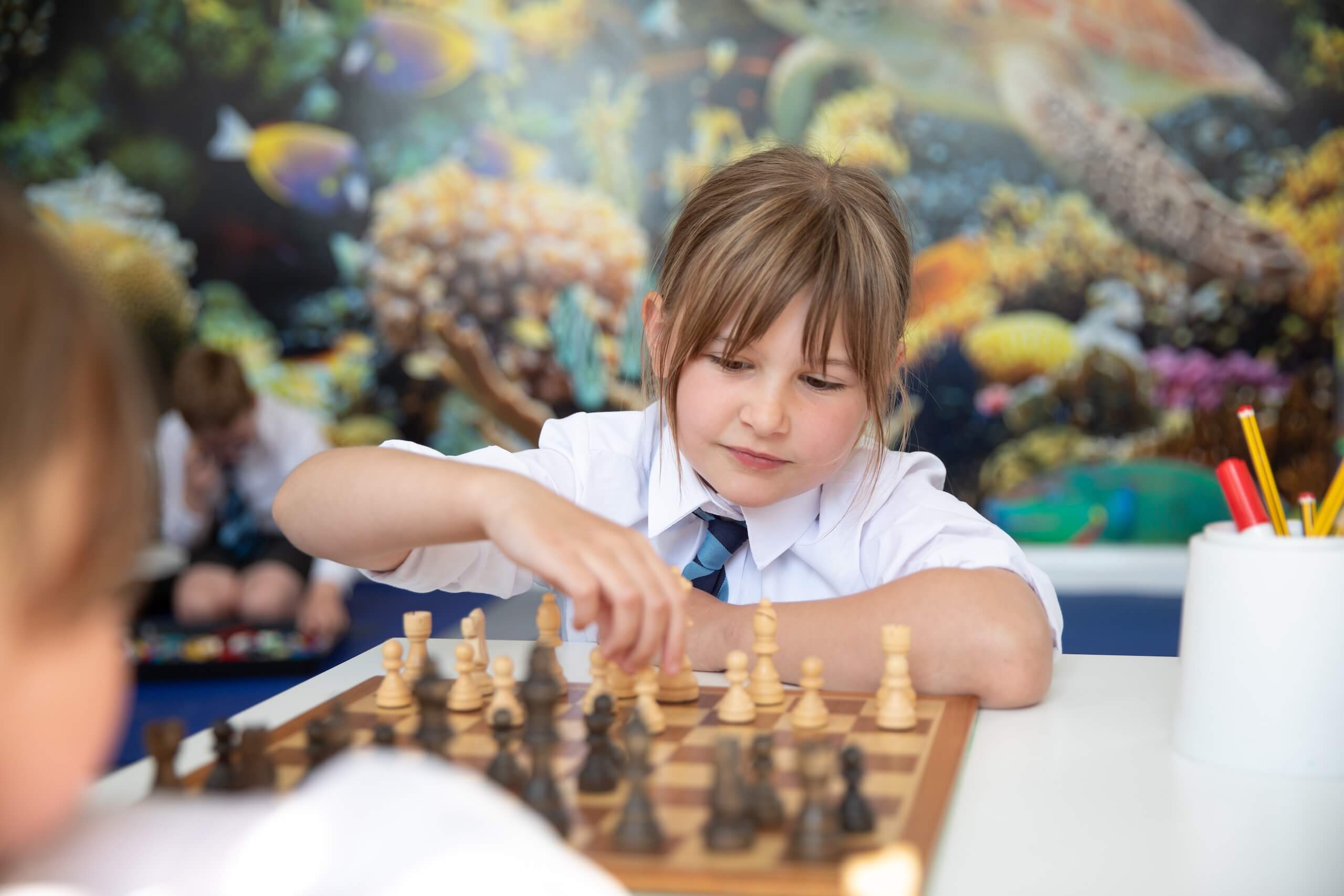 Prep student playing chess