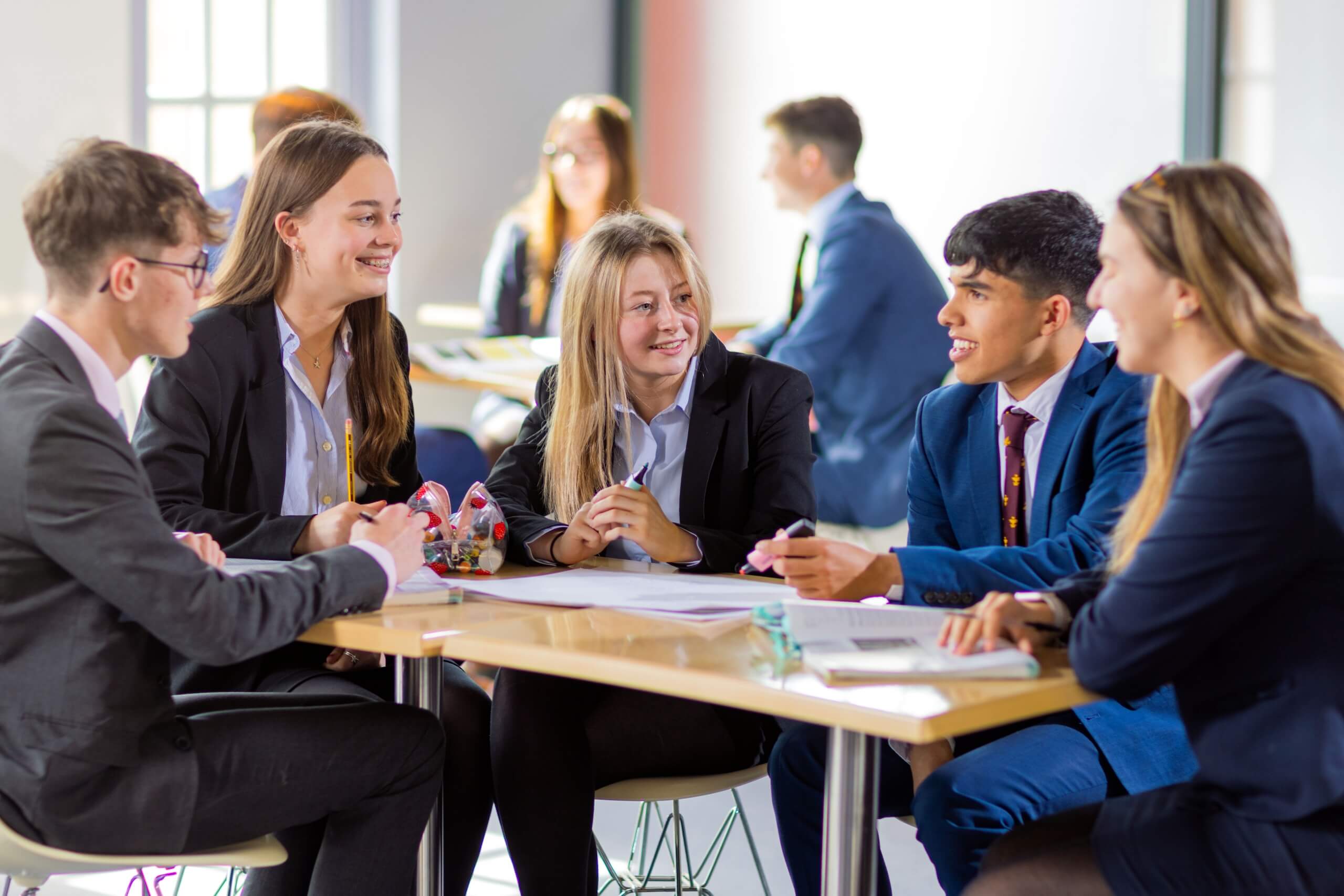 Sixth Formers chatting in sixth form study area