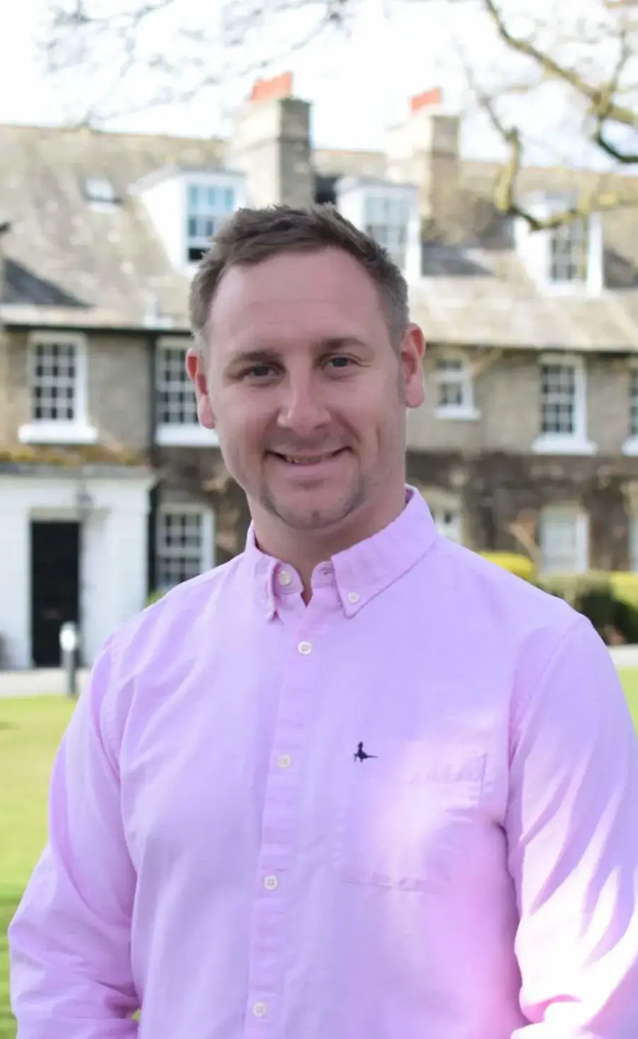 Head and shoulders shot of Charlie Lambert sports teacher at Pocklington School