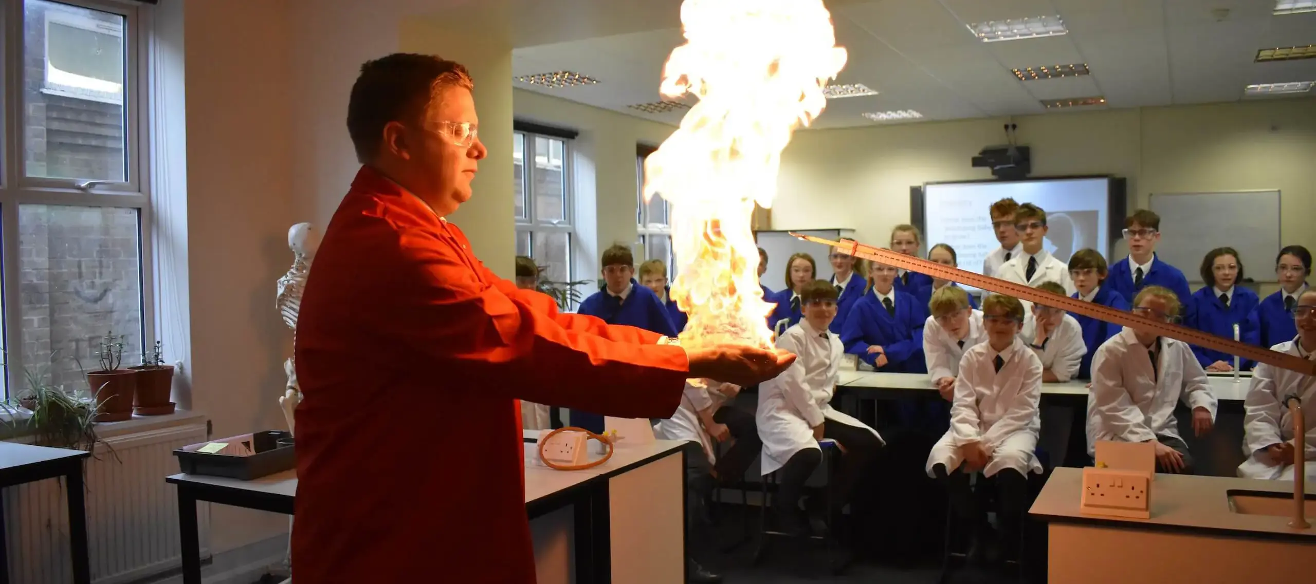 Pocklington School Head Teacher doing flaming hands experiment in Chemistry