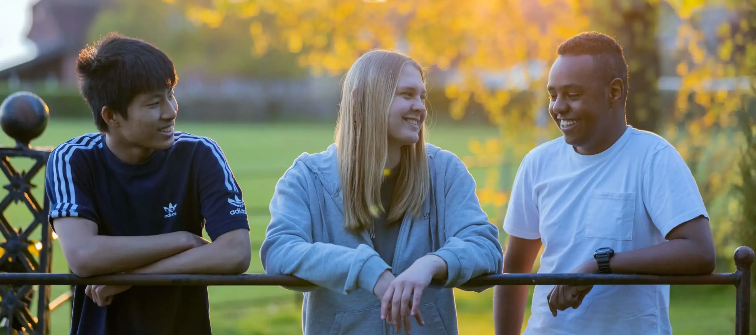 Pocklington School boarders talking together on campus