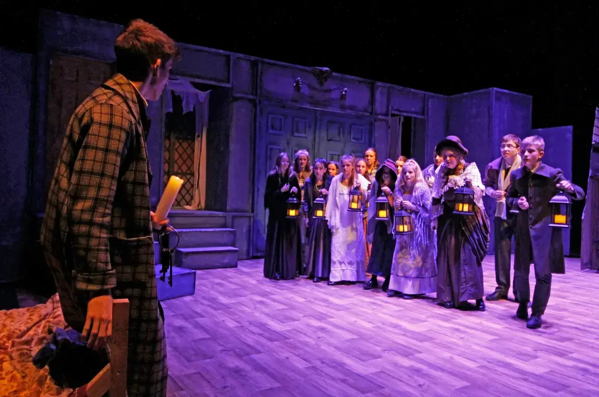 Sixth Form students and other pupils in drama production of A Christmas carol