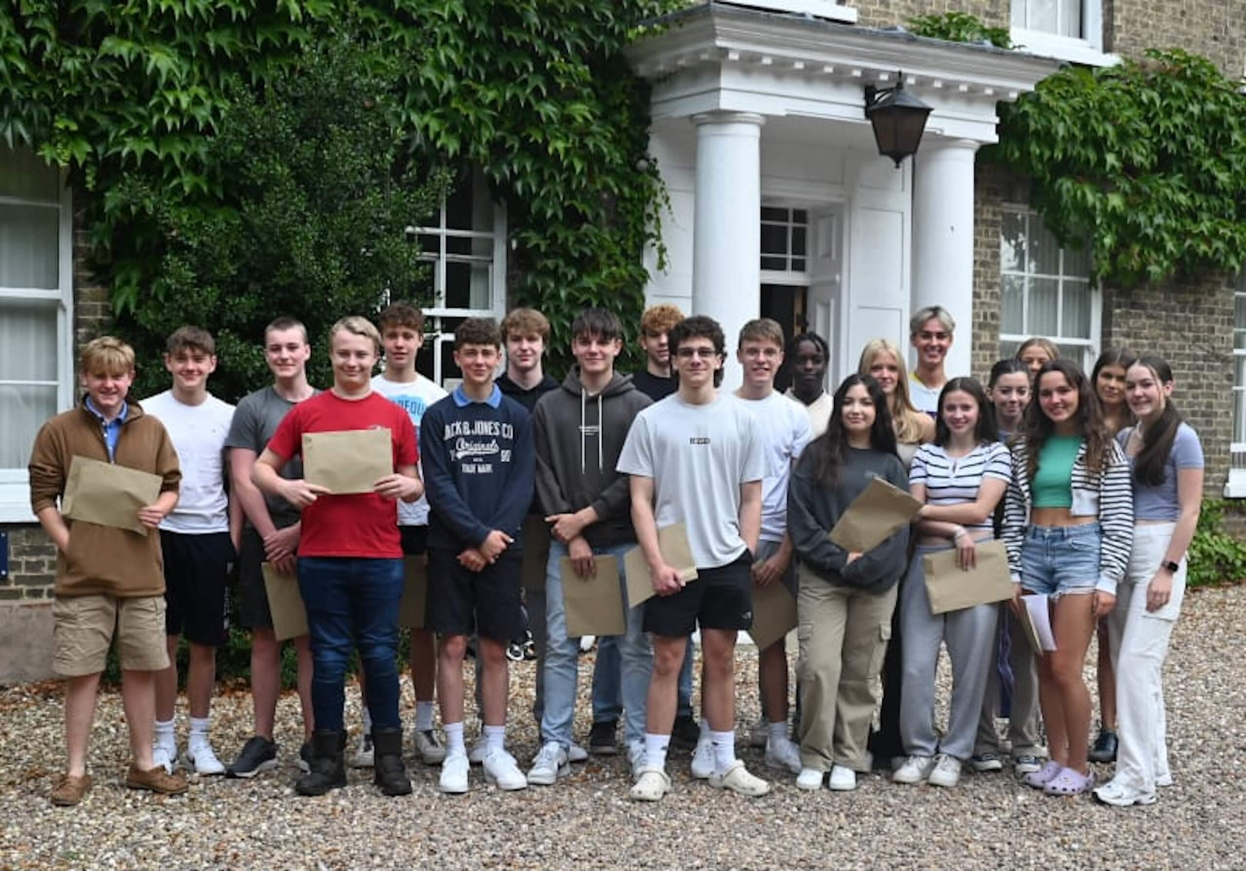 Pocklington GCSE students smiling with their results