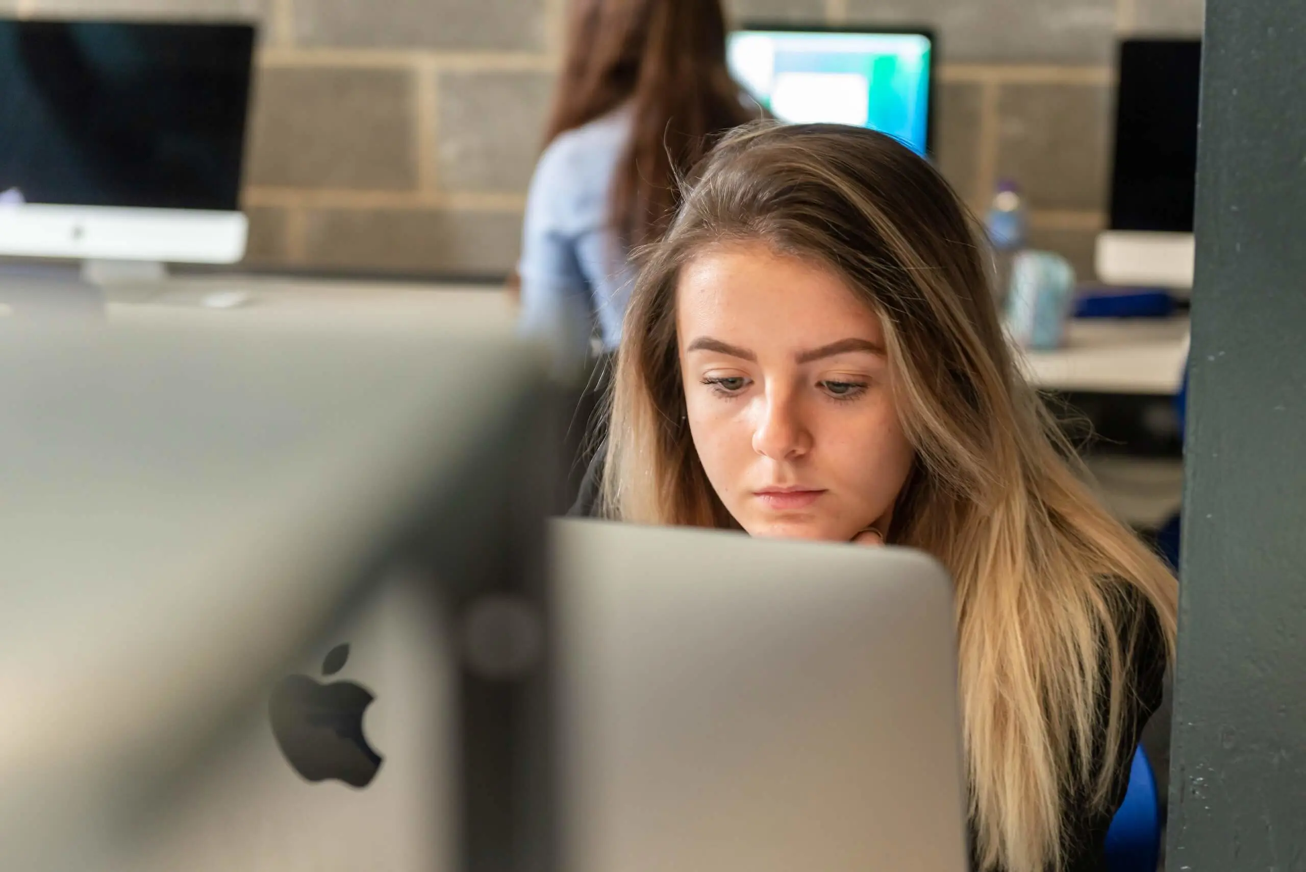 Pocklington School Sixth Former working on a computer