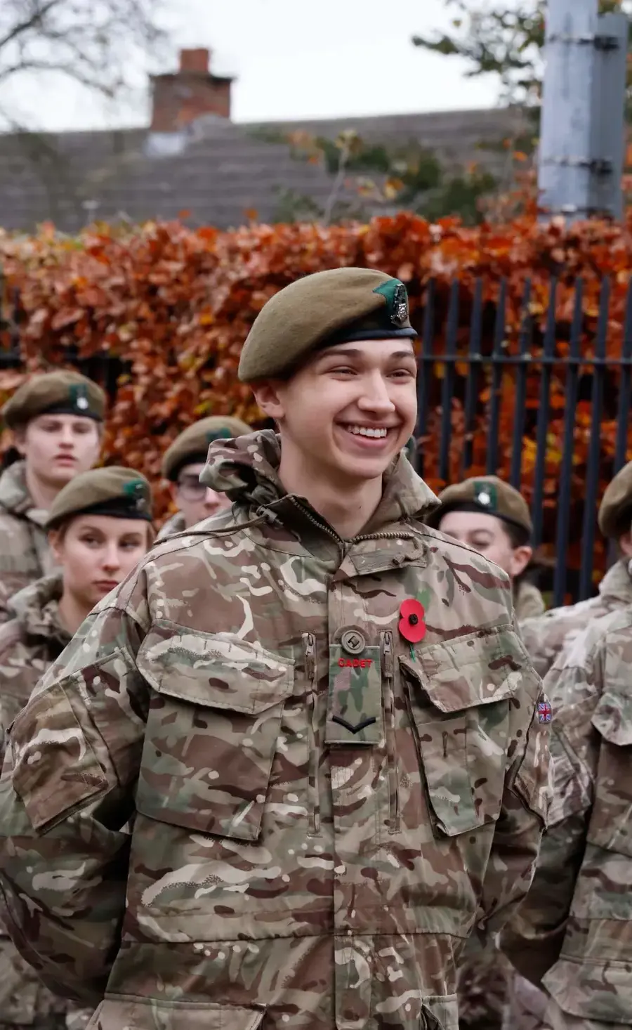 Pocklington School Combined Cadet Force student smiling at remembrance day parade 