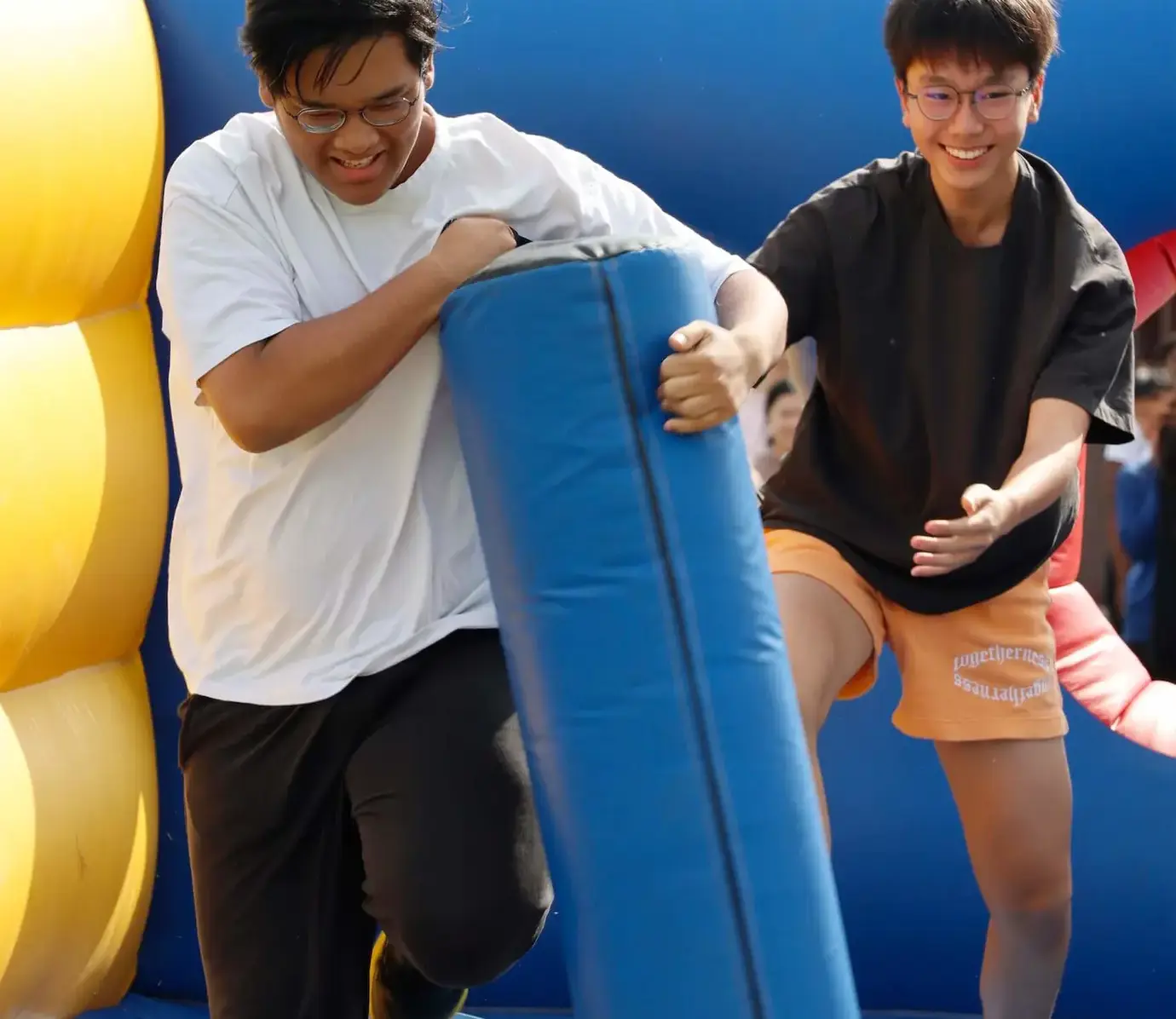 International boarders enjoying an outdoor soft play activity