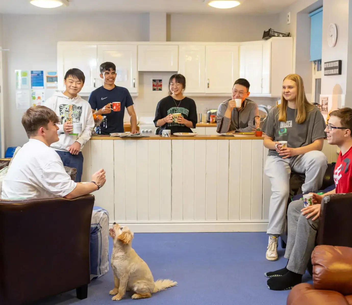 Pocklington School Boarding pupils socialising in boarding house kitchen