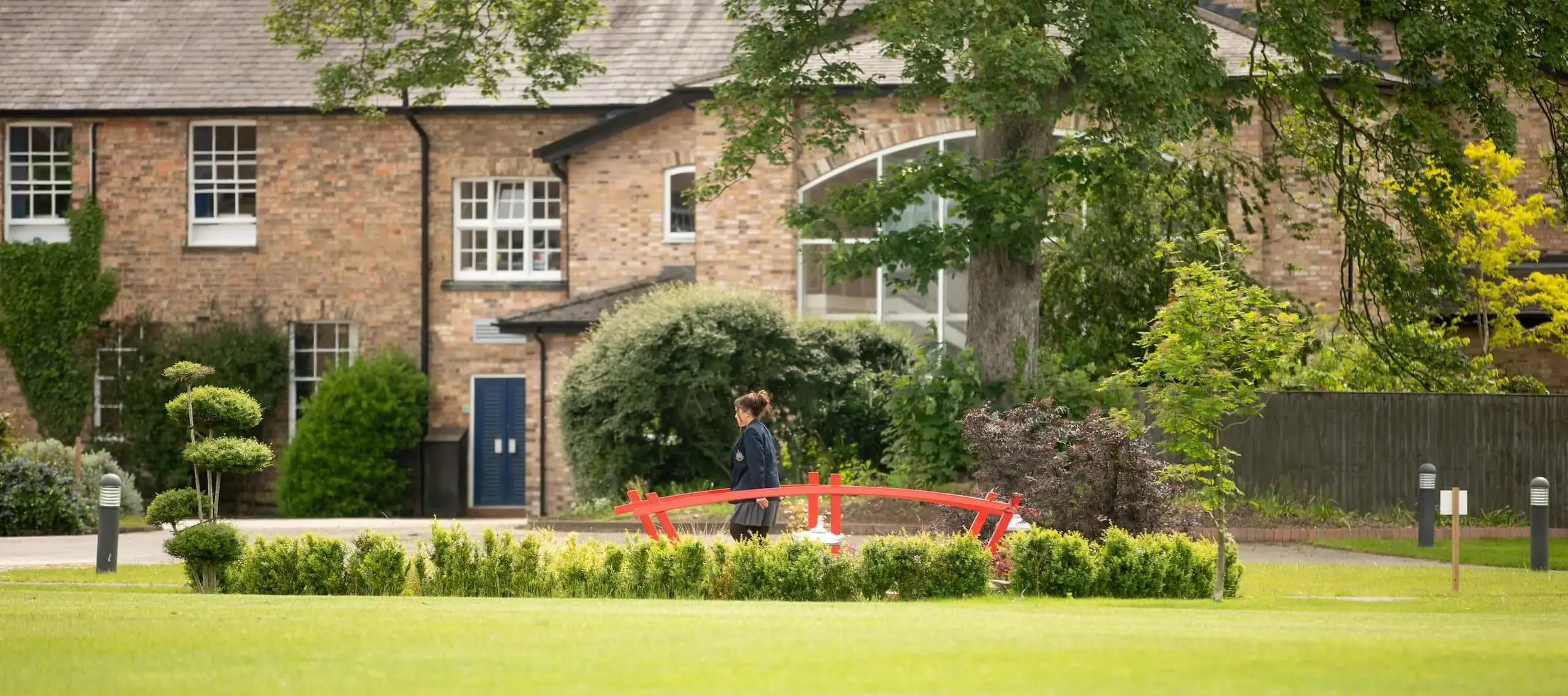 Pocklington School campus Japanese Garden with red bridge