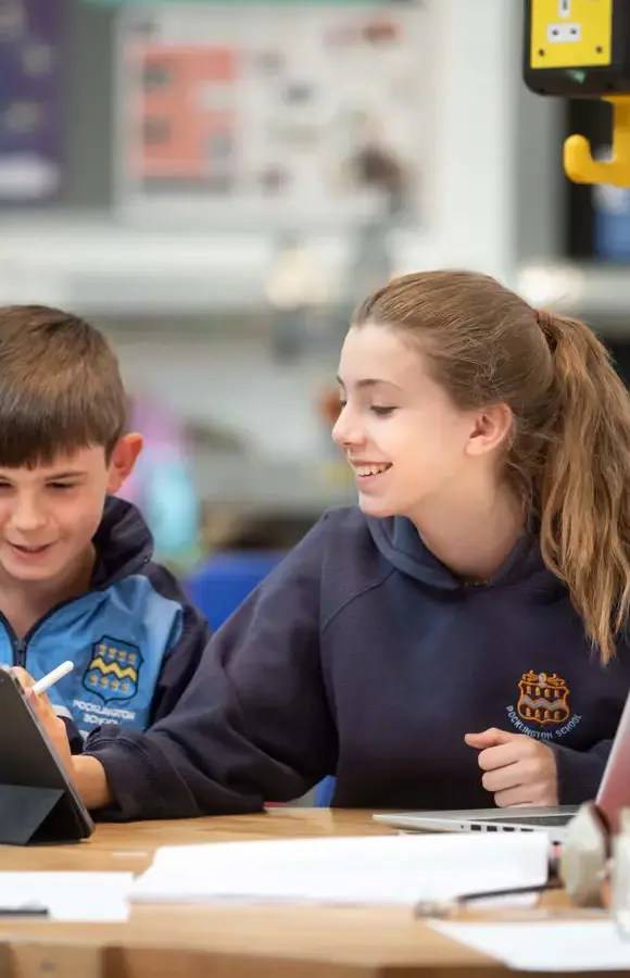 Pocklington School pupils working on ;laptops in Art and Design Technology Centre