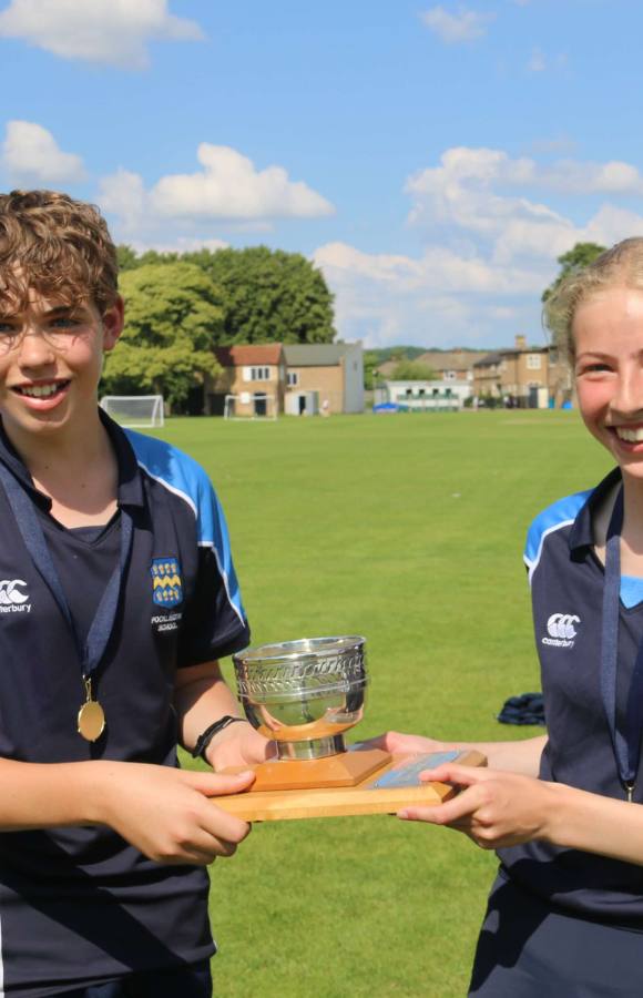 Pocklington School pupils with trophies on sports day