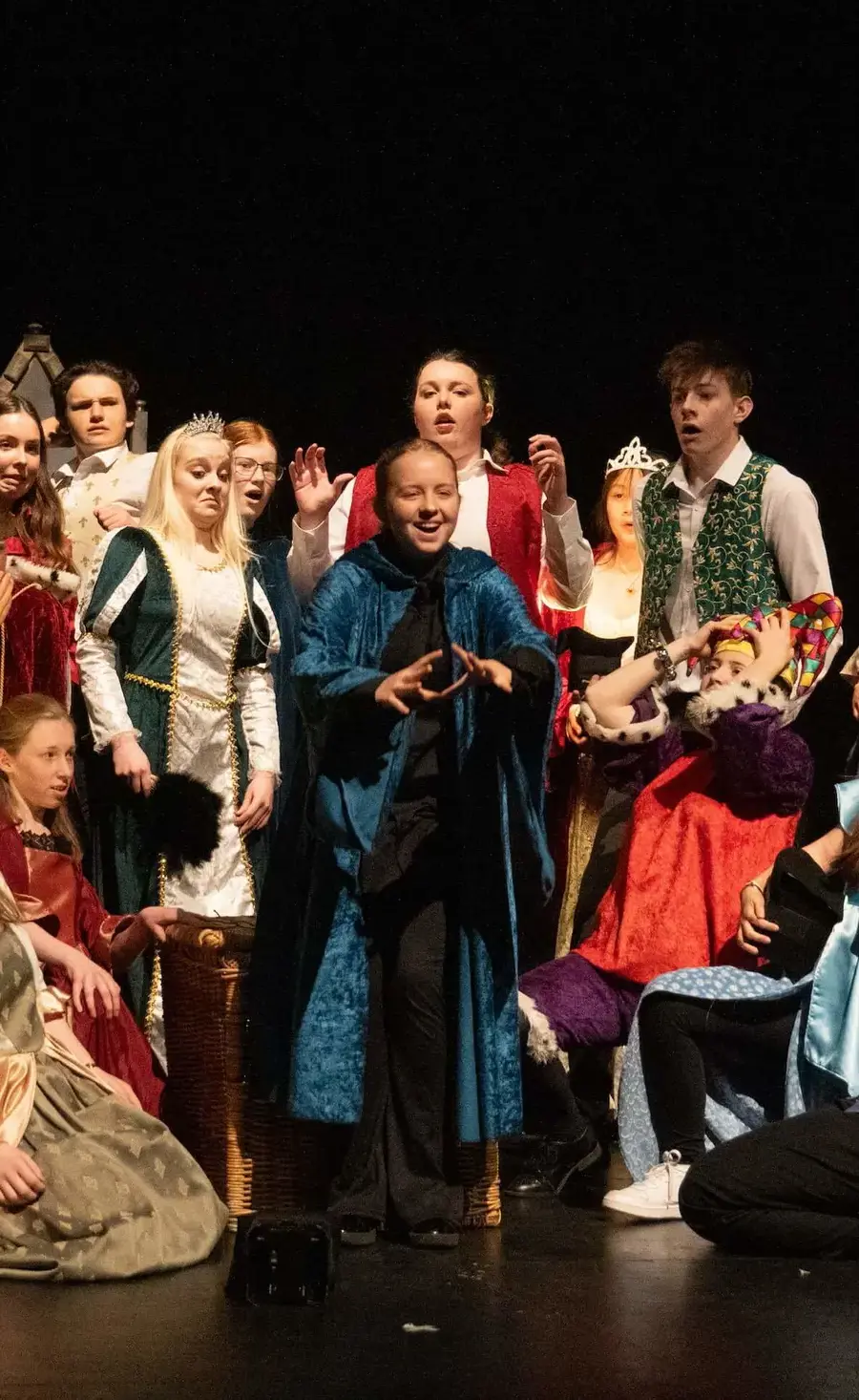 Pupils dressed in costume in the Tom Stoppard Theatre during a performance at Pocklington School